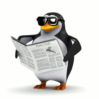 Пингвин ТУКС читает газету